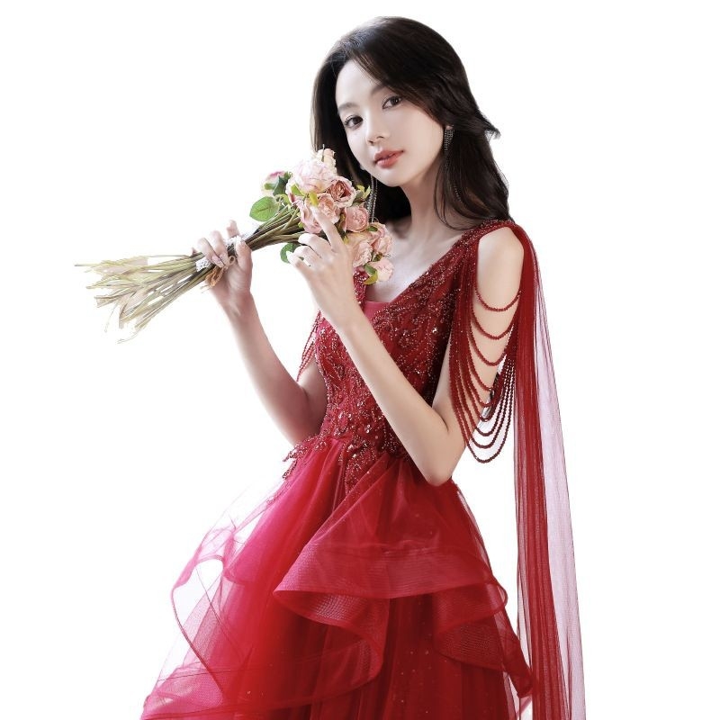 Crvena večernja haljina, duboki V-izrez, bez rukava, A-liniijski kroj, duga suknja, visok struk