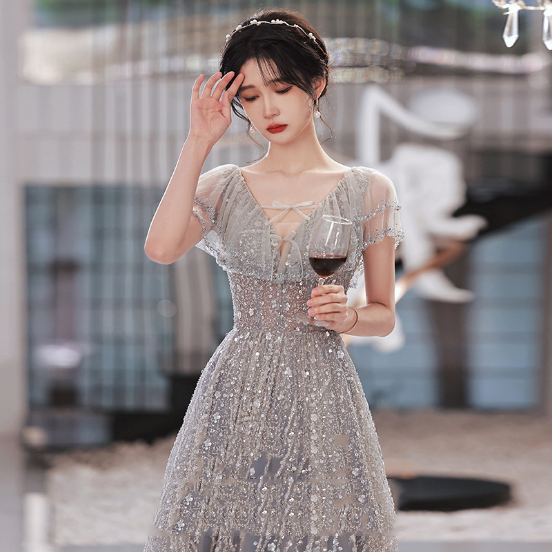 Rochie de seară în linie A, decolteu în V profund, mâneci 3/4, lungă, poliester