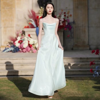 Rochie inspirată de Hepburn, fără mâneci, talie înaltă, lungă, din amestec acetat-poliester