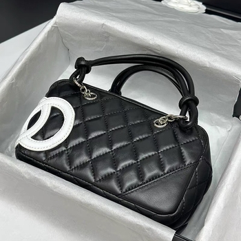 Torba od prave kože, jastukastog oblika, Boston stil, zatvarač, poliester podstava, unutarnja pretinica za mobitel, dvostruke naramenice, ljeto 2025