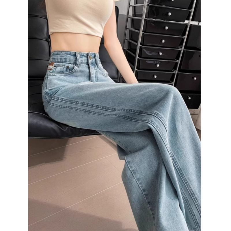 Jeans din denim - croială largă, talie înaltă, croială dreaptă; 50–70% bumbac, poliester <30%; neelastic, finisaj vopsire
