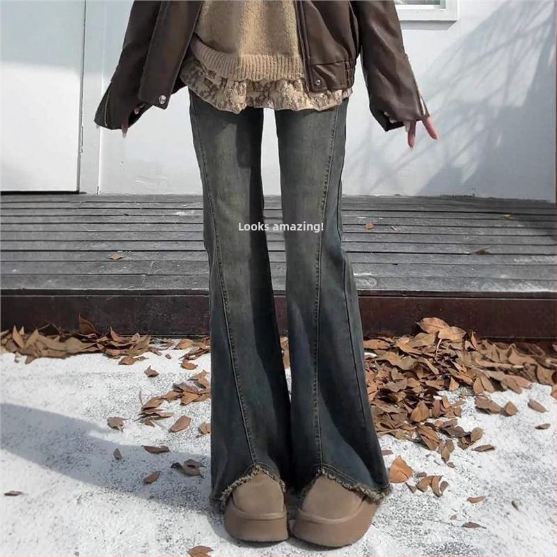 Džíny denim s rozšíreným strihom, vysoký pás, mikroelastické, surový okraj.