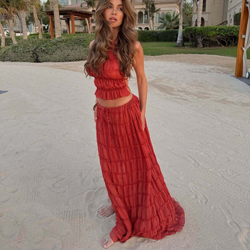 Kostim s suknjom, bez rukava, s otvorenim leđima i prilagodljivim halter vratom, duga suknja, jednostavan uzorak, poliester-elastan, ljeto 2025, elegantan stil