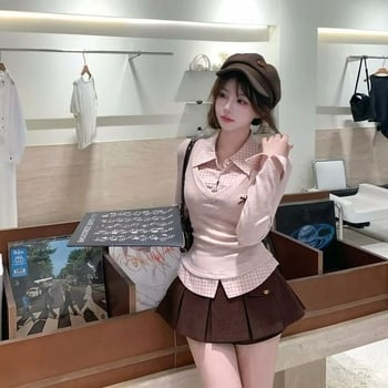 Set dvije komponenti: košulni top i suknja s visokim strukom — jesen 2025, poliester 70–80%, dugi rukavi, šivanje spajanja, djevojački stil