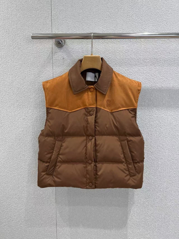 Ženska down vest jakna s reverom, 76–80% bijelo patka perje, srednja debljina, kopčanje na jedno red, srednja dužina (50–65 cm), Zima 2025
