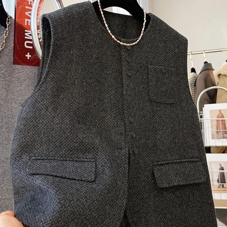 Ženski karirani quiltani vuneni prsluk, 95% vuna, kratka duljina, okrugli ovratnik