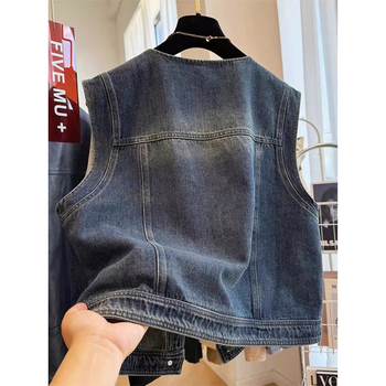 Ženski džins vest-jakna, okrugli izrez, širok kroj, bez rukava, materijal denim/pamuk, proljeće 2025