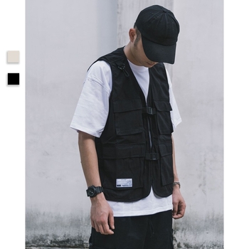 Darba veste ar vairākām kabatām, bez piedurknēm, V kakla, brīvs piegriezums, 100% kokvilna