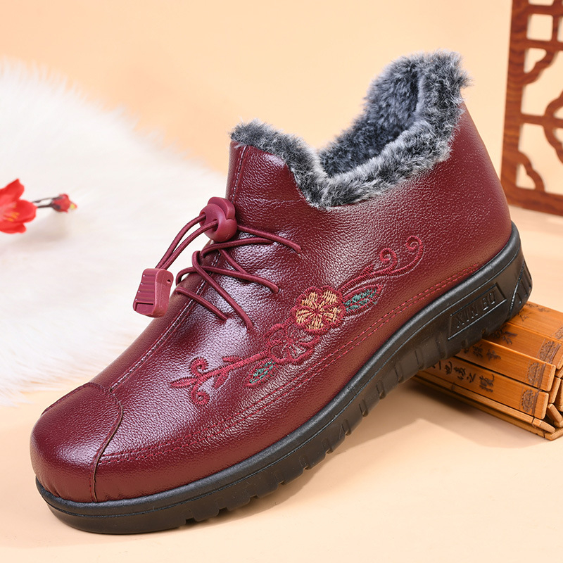 Dámske zimné bavlnené topánky, fleecovou podšívkou, protišmykové a nepremokavé, okrúhla špička, vrchná časť z mikrovlákna.