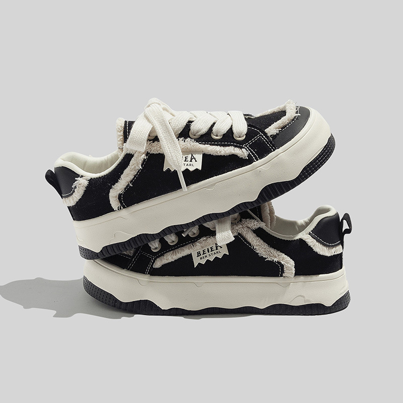 Dámske plátenné tenisky – nízky vrch, gumová podrážka, vulkanizovaná konštrukcia, zapínanie na šnúrky vpredu, funkcia zvyšovania výšky