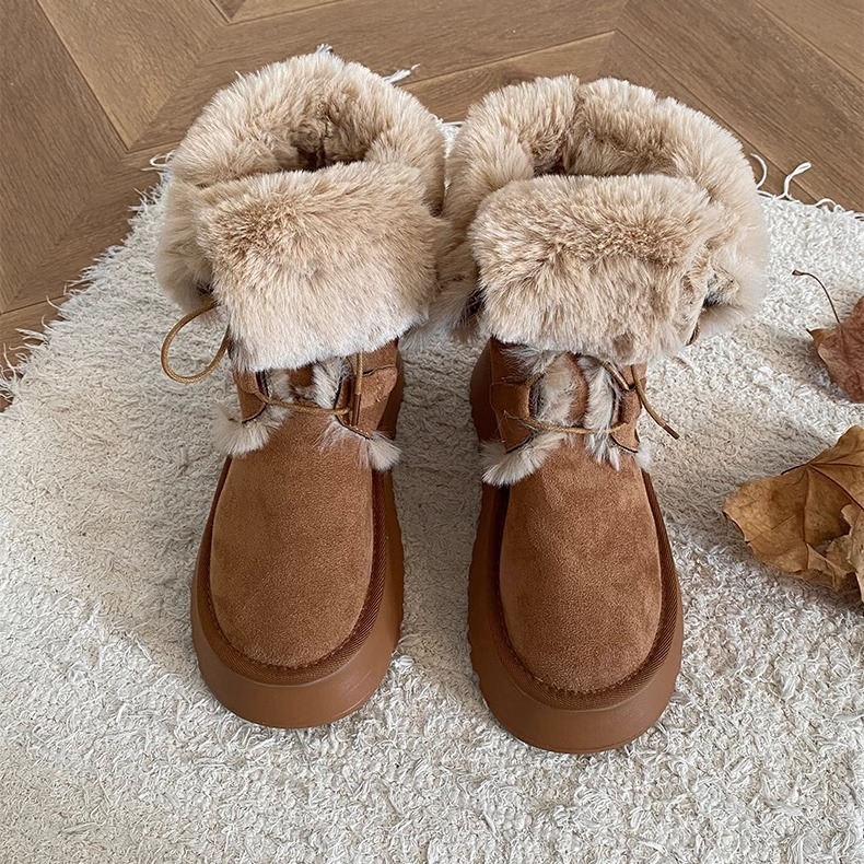 Ghete de zăpadă cu tibie înaltă, exterior din piele sintetică, căptușite cu blană artificială, talpă din cauciuc gros, vârf rotund