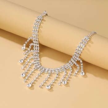 Brățară exotică pentru gleznă din argint, cu pandantiv în formă de picătură și încrustări de pietre în aur alb