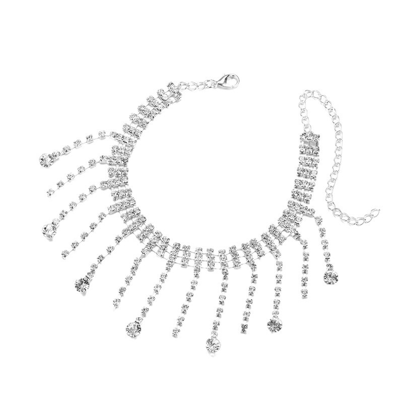 Brățară exotică pentru gleznă din argint, cu pandantiv în formă de picătură și încrustări de pietre în aur alb