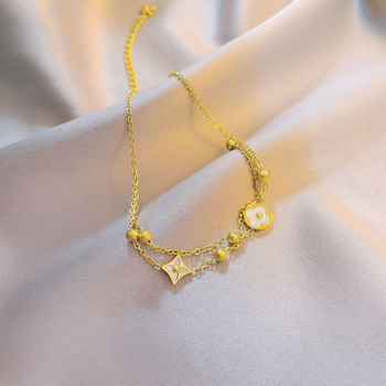 Глезенна гривна с двоен четирилистник, титаниева стомана, кръгли мъниста, флорален мотив