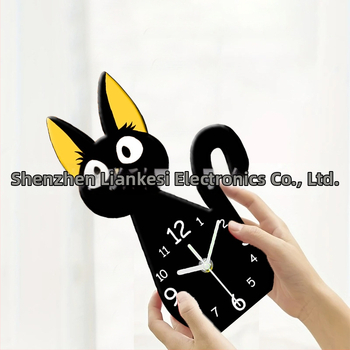 Emoyo настолен часовник с котешки дизайн, акрилен корпус и циферблат, едностранен дисплей, батерийно захранване, плавно движение на секундата, механизъм St