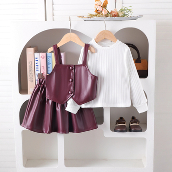 Set de trei piese pentru fete, iarnă 2025: Bluza cu mânecă lungă, vestă din piele PU, fustă scurtă; material principal 95% bumbac; vârsta 1-3 ani