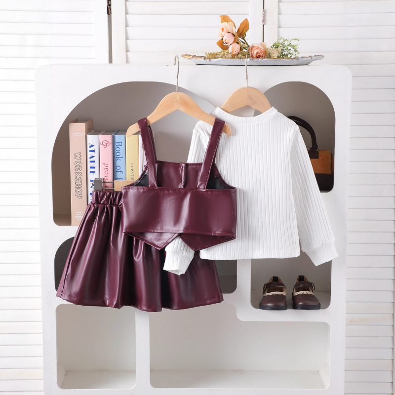 Set de trei piese pentru fete, iarnă 2025: Bluza cu mânecă lungă, vestă din piele PU, fustă scurtă; material principal 95% bumbac; vârsta 1-3 ani