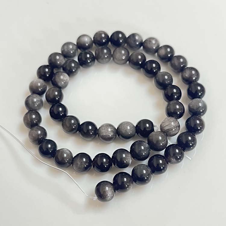 DIY karkötőhöz szabad gyöngyök ezüst obsidiánból, kerek gyöngyök, nemes mintázat, megmunkált és polírozott