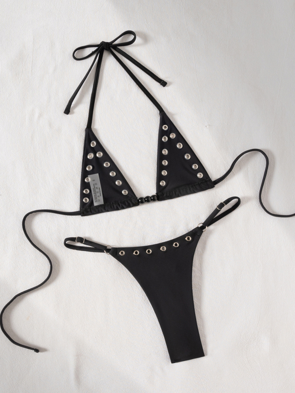 Dvije dijela bikini s mikro trokutom i vezicama na leđima, otvoreni stražnji dio; materijal najlon 82% poliamid 18% elastan; podstava najlon 82/18; težina 110 g; bez košuljice i bez jastučića