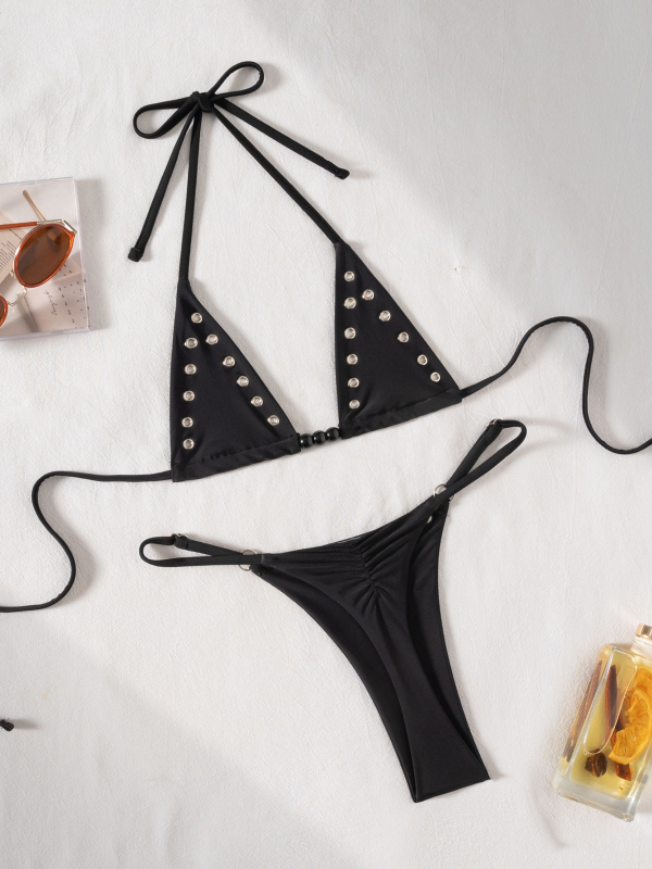 Dvije dijela bikini s mikro trokutom i vezicama na leđima, otvoreni stražnji dio; materijal najlon 82% poliamid 18% elastan; podstava najlon 82/18; težina 110 g; bez košuljice i bez jastučića