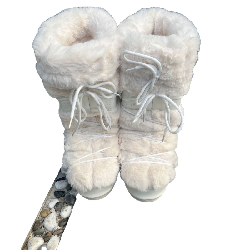 Női középmagasságú hócsizma: vízálló, csúszásmentes, meleg, felső rész szintetikus bőr, gumí talp, belső műszőrmével