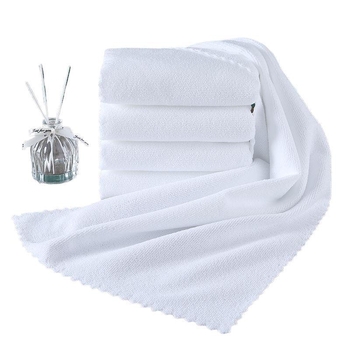 Set od 100 jednokratnih bijelih ručnika, bez vlakana, kvadratnog oblika, za hotele, banje, spa centar i salone za kosu.