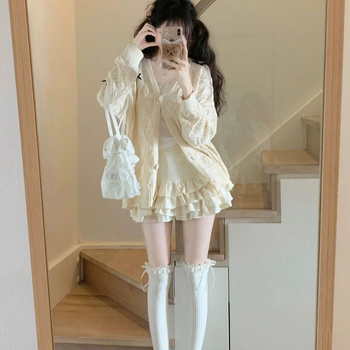 Kötött kardigán lyukacsos mintázattal, pillangó csomóval, V-nyakú, ujj nélküli