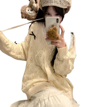 Kötött kardigán lyukacsos mintázattal, pillangó csomóval, V-nyakú, ujj nélküli