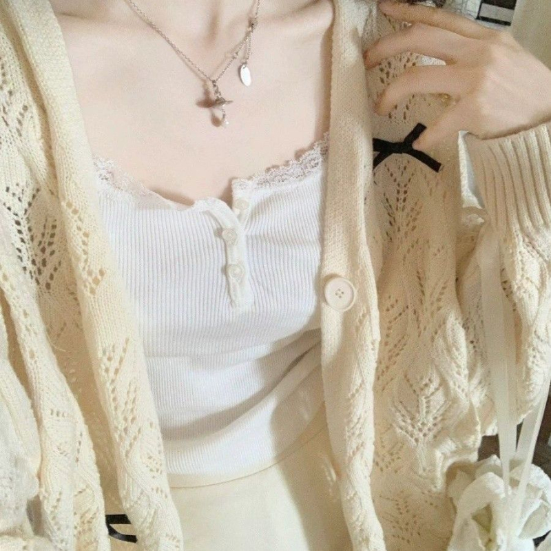 Kötött kardigán lyukacsos mintázattal, pillangó csomóval, V-nyakú, ujj nélküli