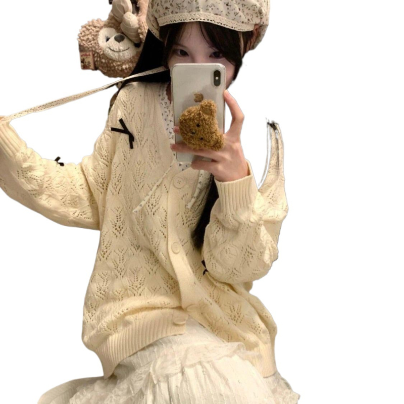 Kötött kardigán lyukacsos mintázattal, pillangó csomóval, V-nyakú, ujj nélküli