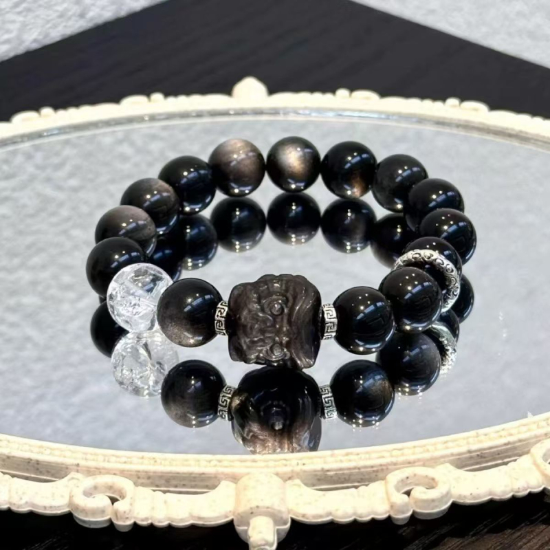 Prirodni obsidijan narukvica s motivom probuđenog lava, srebrni obsidijan, crno-bijeli kristali, mačje oko – unisex nakit