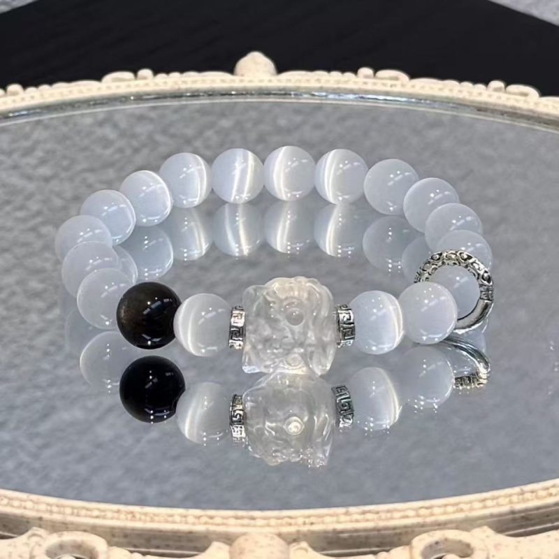 Prirodni obsidijan narukvica s motivom probuđenog lava, srebrni obsidijan, crno-bijeli kristali, mačje oko – unisex nakit