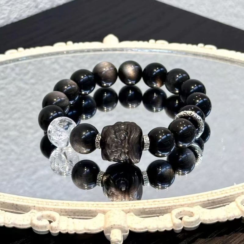 Prirodni obsidijan narukvica s motivom probuđenog lava, srebrni obsidijan, crno-bijeli kristali, mačje oko – unisex nakit