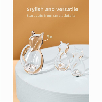 Caurskatāms sveķu kaķa motīva āķis – sienai bez urbšanas, vienkāršs karikatūras stils, maksimālā slodze 0–1 kg, izlaidums 2025