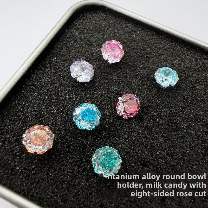 Ausu kaula naglas – titāna sakausējums, elektroapdare, universālais stils, viegls luksuss, cirkona kristāli