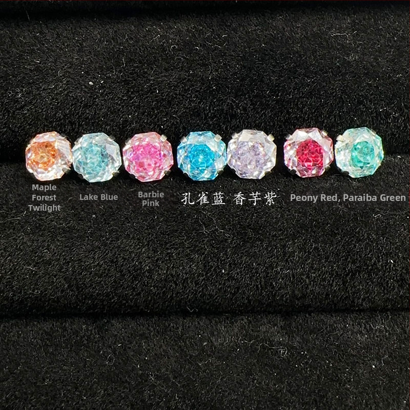 Ausu kaula naglas – titāna sakausējums, elektroapdare, universālais stils, viegls luksuss, cirkona kristāli