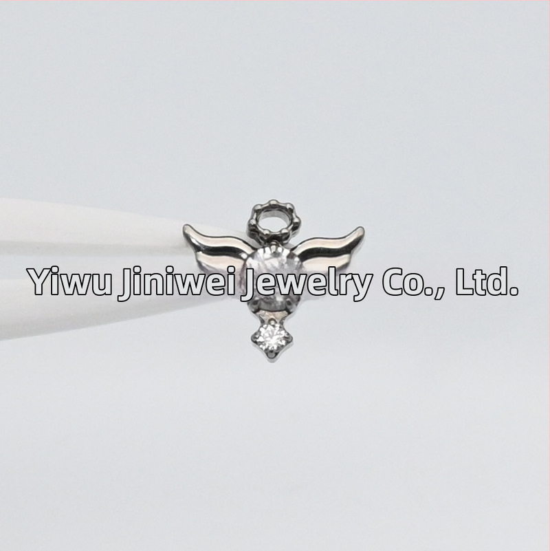 Auskari no implantējama titāna sakausējuma ar eņģeļu spārniem un dimantiem, karikatūras stilā, unisex