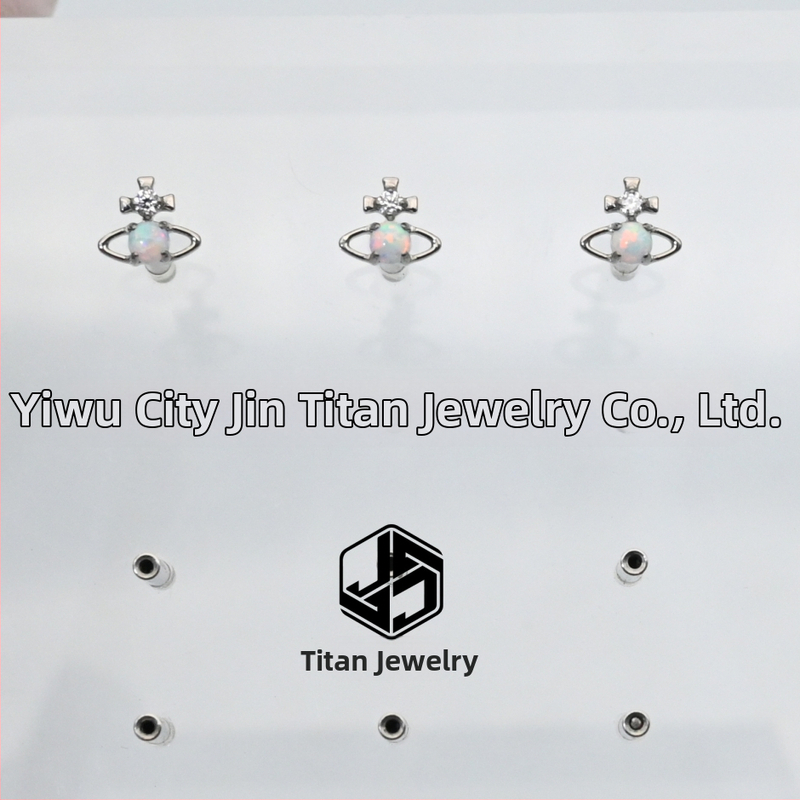 Auskari no implantējama titāna sakausējuma ASTM F-136, zvaigznītes forma, dimanta apstrāde, kristāls