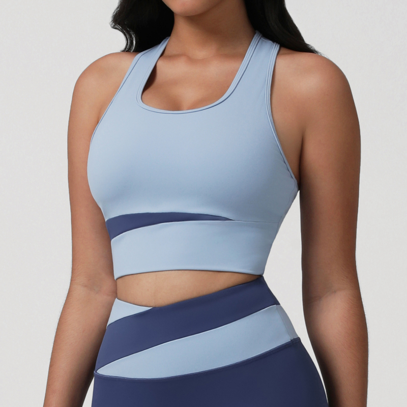 Jógához tervezett sportmelltartó I-formájú hátsó résszel, mellpárnával; anyag: nylon/elastán, 75% nylon, 25% elastán; bélés: elastán; kosár: teljes; formázott kosár: közepes; pántok rögzítettek