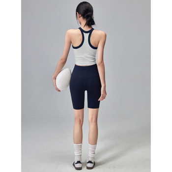 Sportos mellény rögzített melltartóval, fő anyag 80% nylon, bélés 80% nylon, 3/4 kosár, merev vállpántok