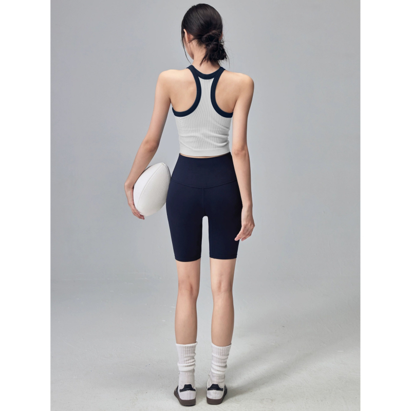 Sportos mellény rögzített melltartóval, fő anyag 80% nylon, bélés 80% nylon, 3/4 kosár, merev vállpántok