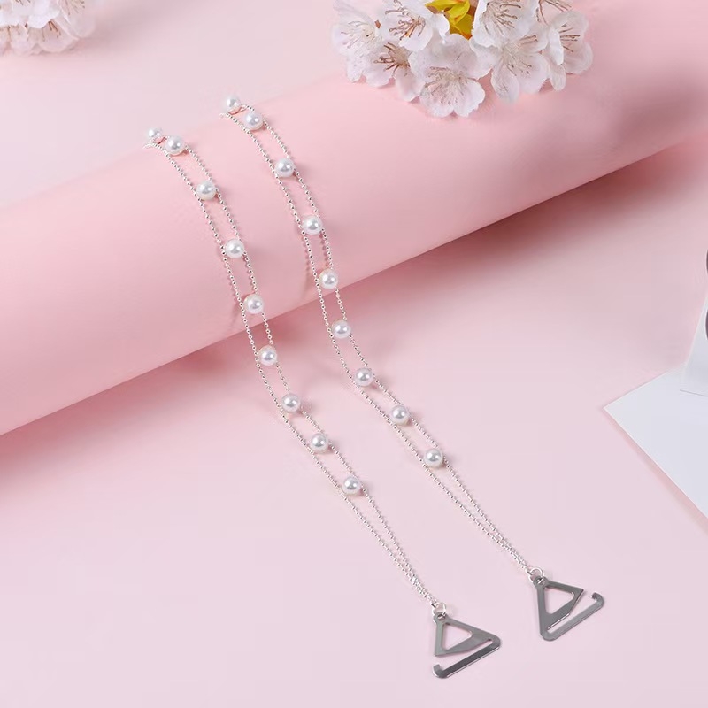 Moteriški apatiniai su perlo kūno grandine ir pečių dirželiai, varinė grandinė ir perlai, nailono medžiaga, deimantų juvelyrinis stilius