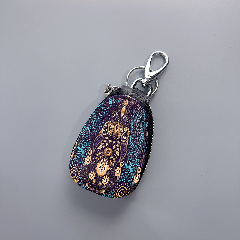 Naistele mõeldud võtmeümbris, ehtne nahk, kahekihiline veiselihast nahk, karikatuurmuster, mugav hoiustamine (Materjal: Ehtne nahk; Tekstuur: Kahekihiline veiselihast nahk; Muster: Karikatuur; Kasutus: Igapäevane)