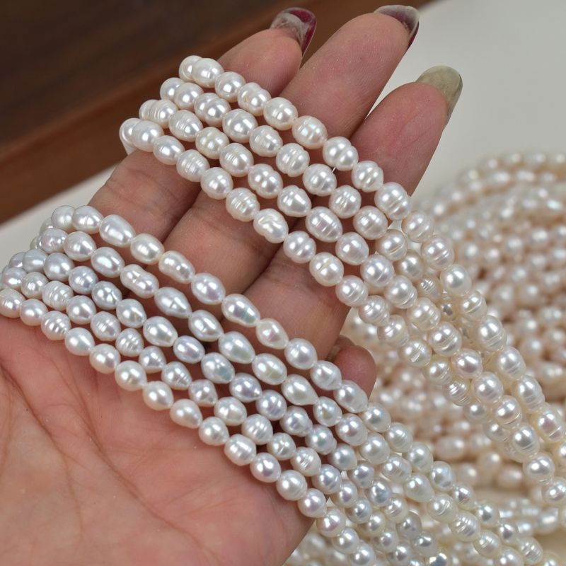 Looduslikud mageveepärlid — bränd: Butterfly shell; stiil: lahtised helmed; pärlite klassifikatsioon: mageveepärlid; toote tüüp: paljad pärlid