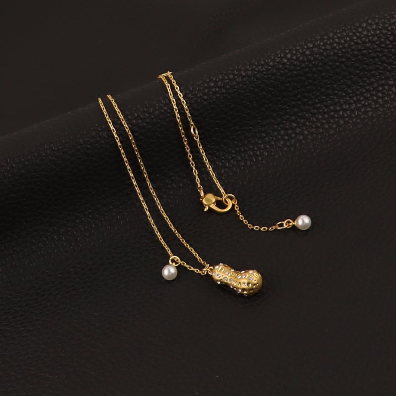 Mogyoró alakú fülbevaló és nyaklánc készlet – réz anyagú, medál: ötvözet, kulcscsont- lánc, divatos városi stílus, 2024 tél