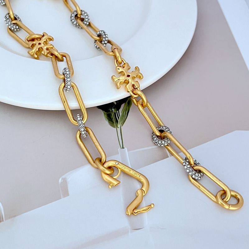 Ženski set nakita: metalni ogrlica i narukvica s geometrijskim zaobljenim 3D slovima, elektroplatirani završetak, uredski stil