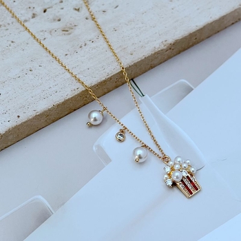 Set nakita: metalne naušnice i ogrlica, lanac u obliku križa, medaljon s kristalima i perlama, ženski stil, ljeto 2024