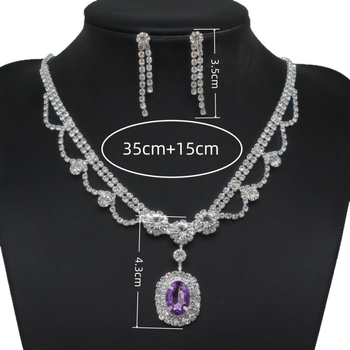 Dva dijela set nakita: ogrlica i naušnice; Materijal: bakrena legura; Privjesak materijal: kristal; Lanac: standardni lanac; Oblik: geometrijski; Marka: tecan