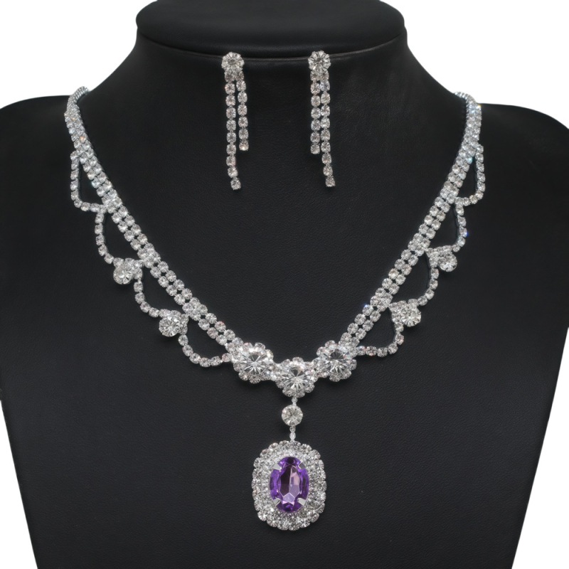 Dva dijela set nakita: ogrlica i naušnice; Materijal: bakrena legura; Privjesak materijal: kristal; Lanac: standardni lanac; Oblik: geometrijski; Marka: tecan