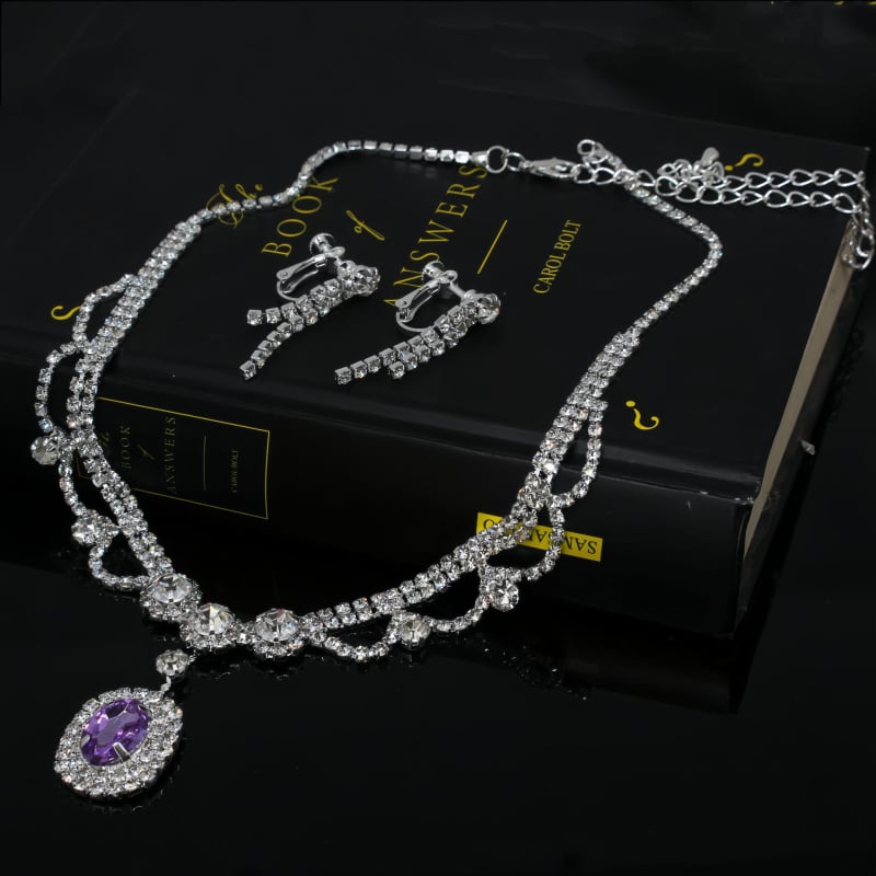 Dva dijela set nakita: ogrlica i naušnice; Materijal: bakrena legura; Privjesak materijal: kristal; Lanac: standardni lanac; Oblik: geometrijski; Marka: tecan